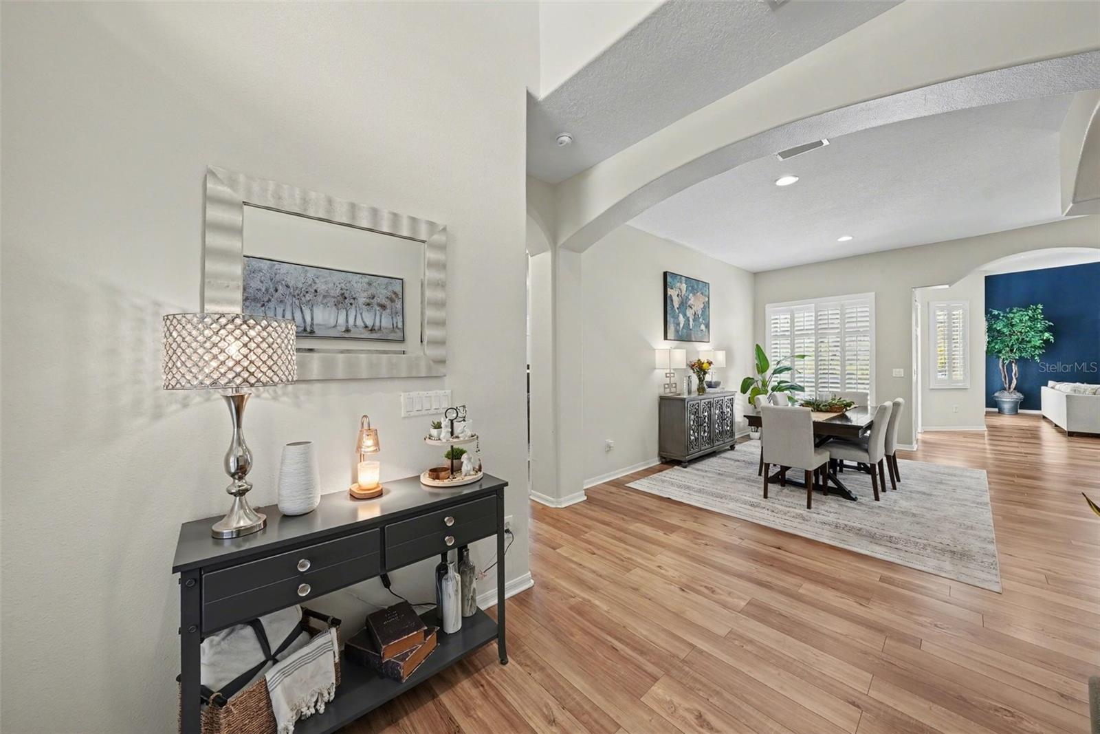 You'll appreciate the thoughtful floor plan which offers both plenty of open spaces and easy flow from one room to the next while also providing a touch of separation, allowing a space for everyone.
