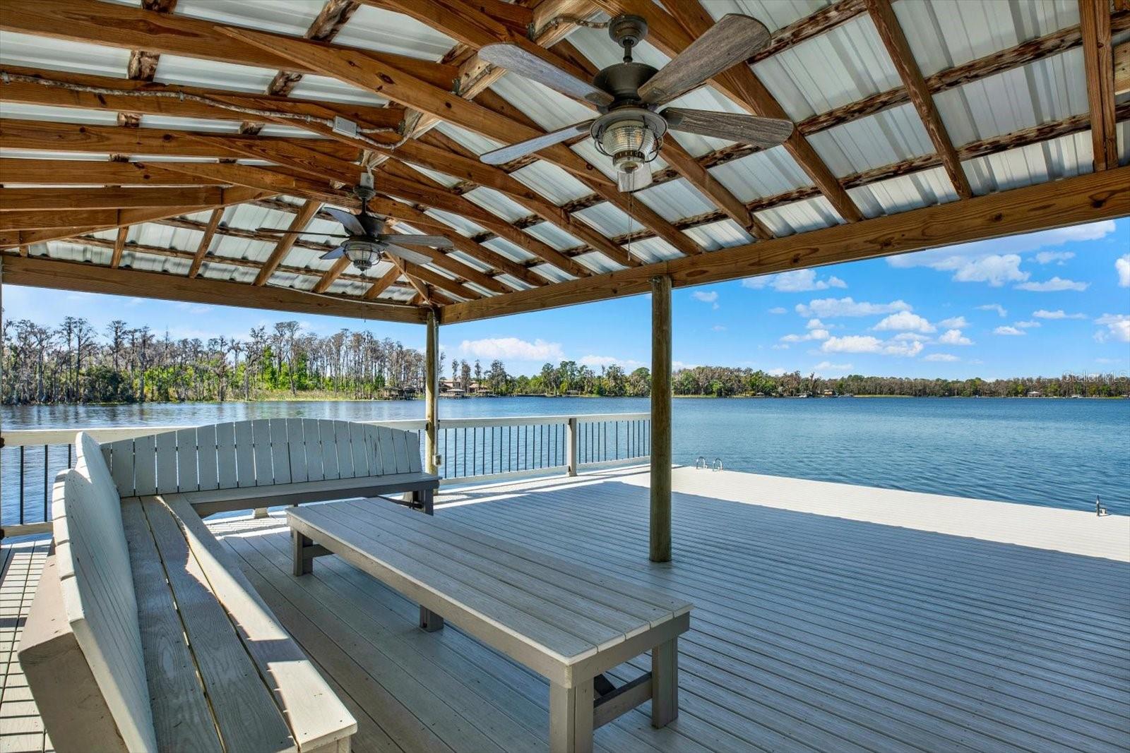 The enormous dock includes built in shaded seating with fans and lighting.