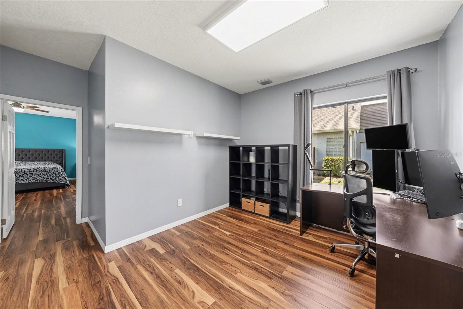 This bonus room is attached the primary bedroom and can be the perfect office space for someone who works from home.