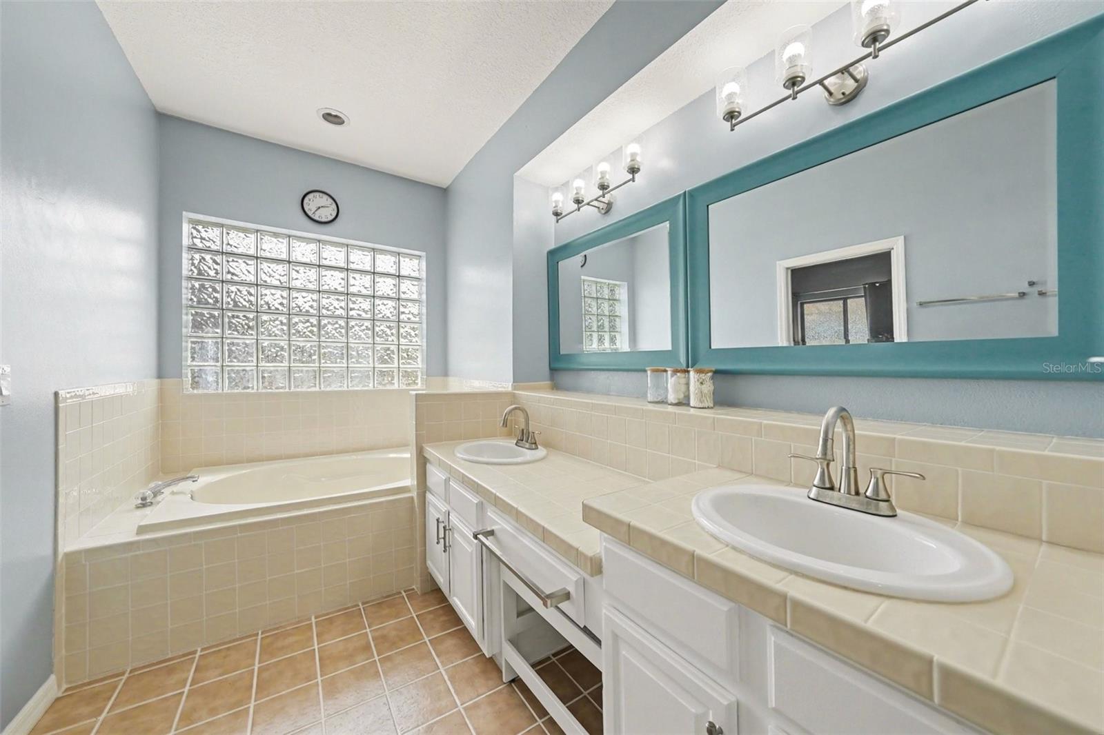 The garden tub for soaking nights!