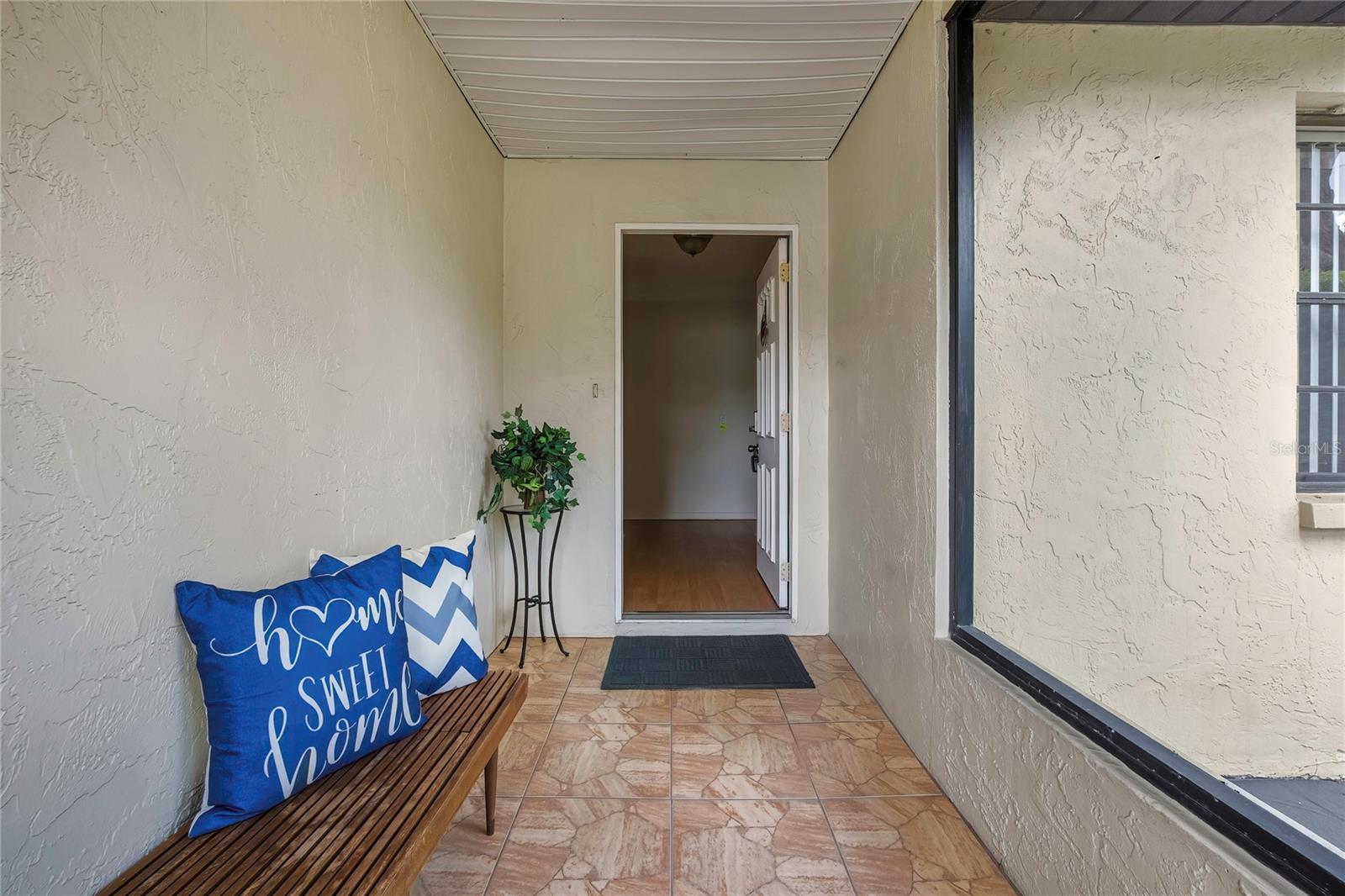 Front porch covered and screened