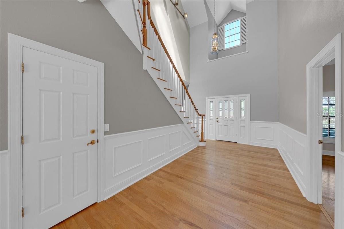 Detailed molding & hardwood floors accent this beautiful home.