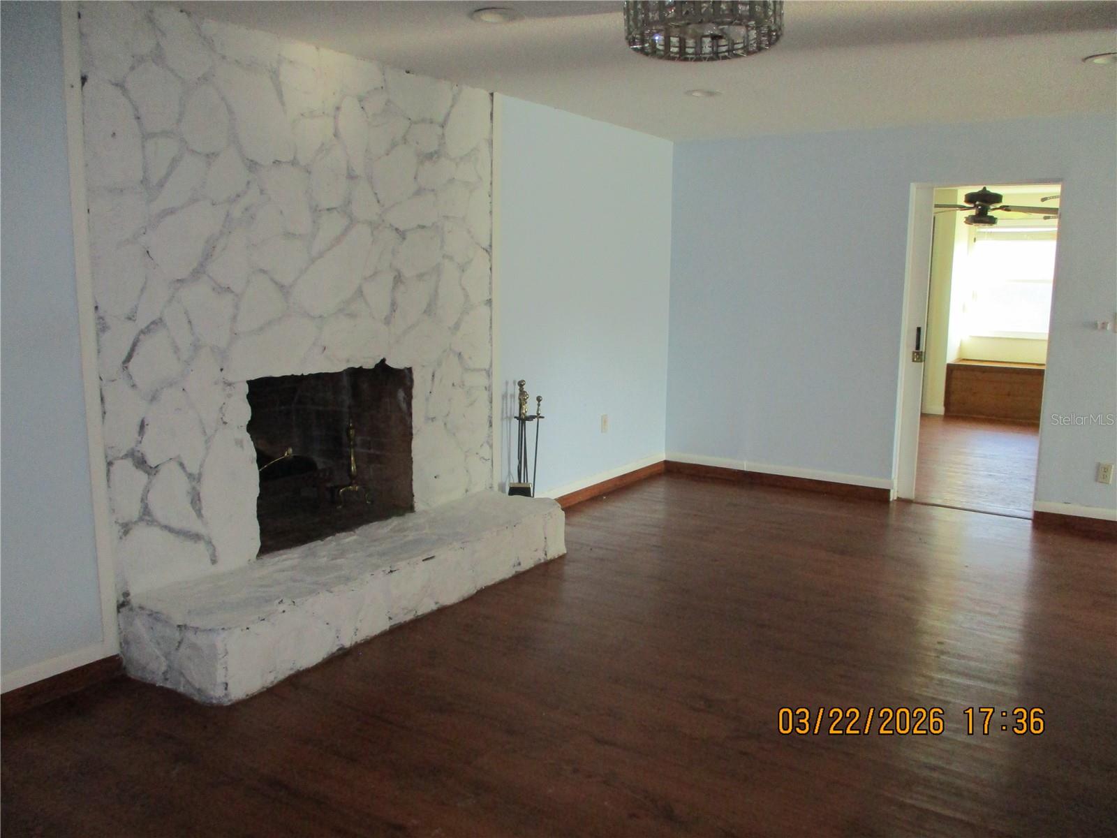 WOOD BURNING FIREPLACE IN FAMILY ROOM