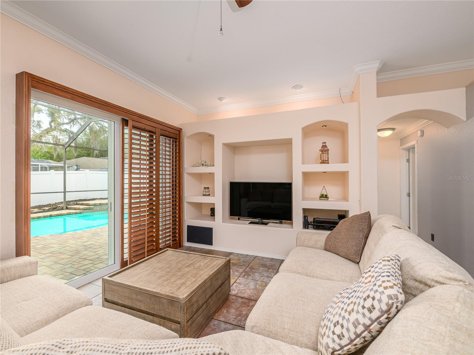 Family room with sliders leading to lanai