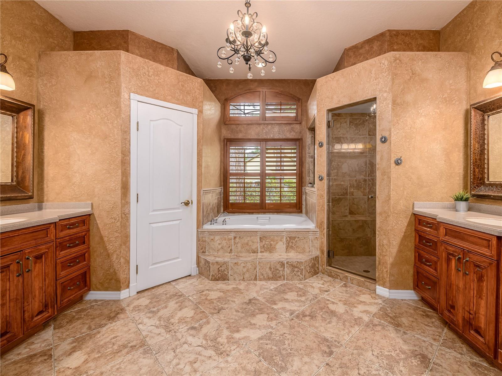 Primary bathroom with dual vanities