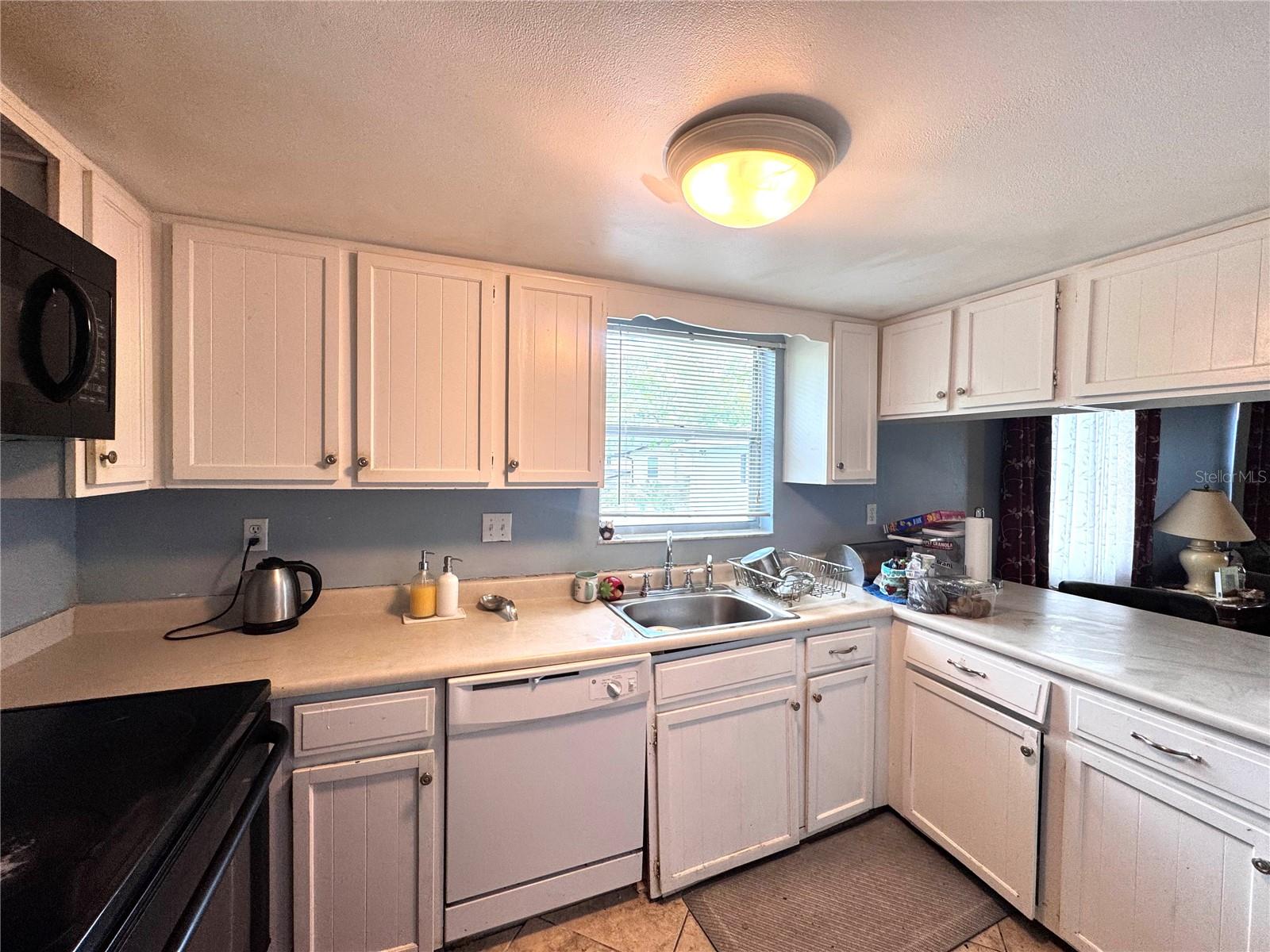 6008 AMBERLY AVE #F63, ORLANDO, FL, 32822