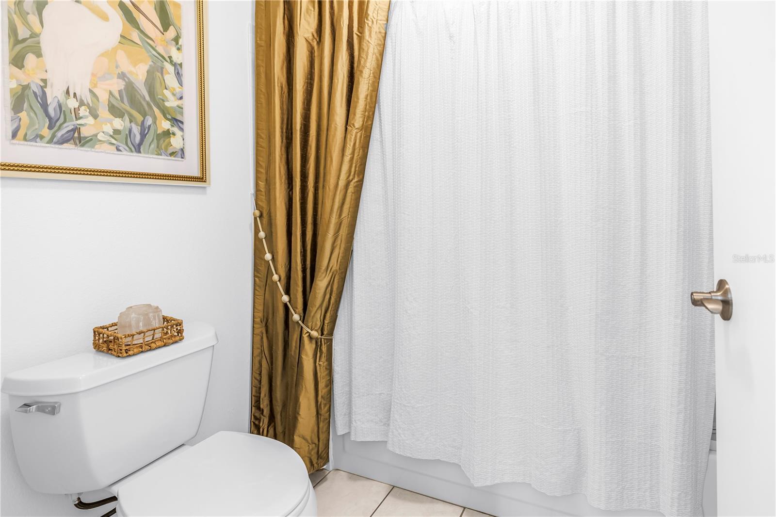 Private Primary bath toilet and shower/tub.