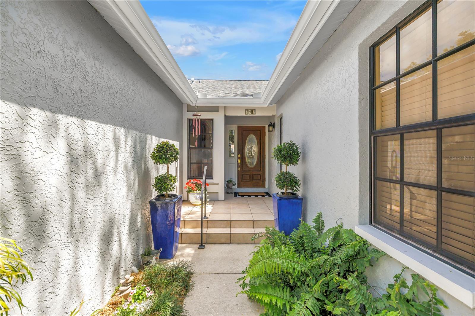 Beautiful Private Courtyard entry to this Caya Costa Villa