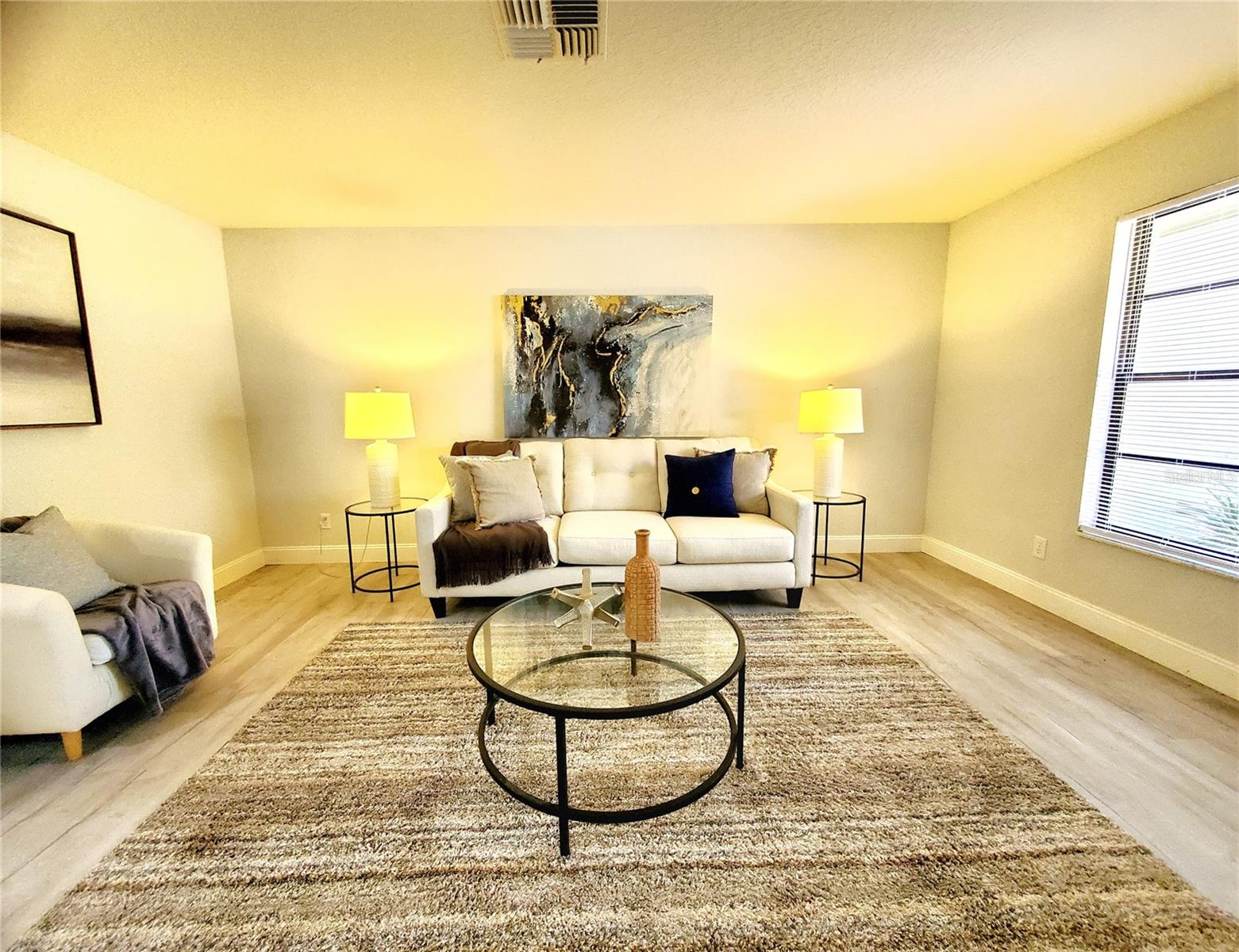 LIVING ROOM (OR POTENTIAL 3RD BEDROOM)