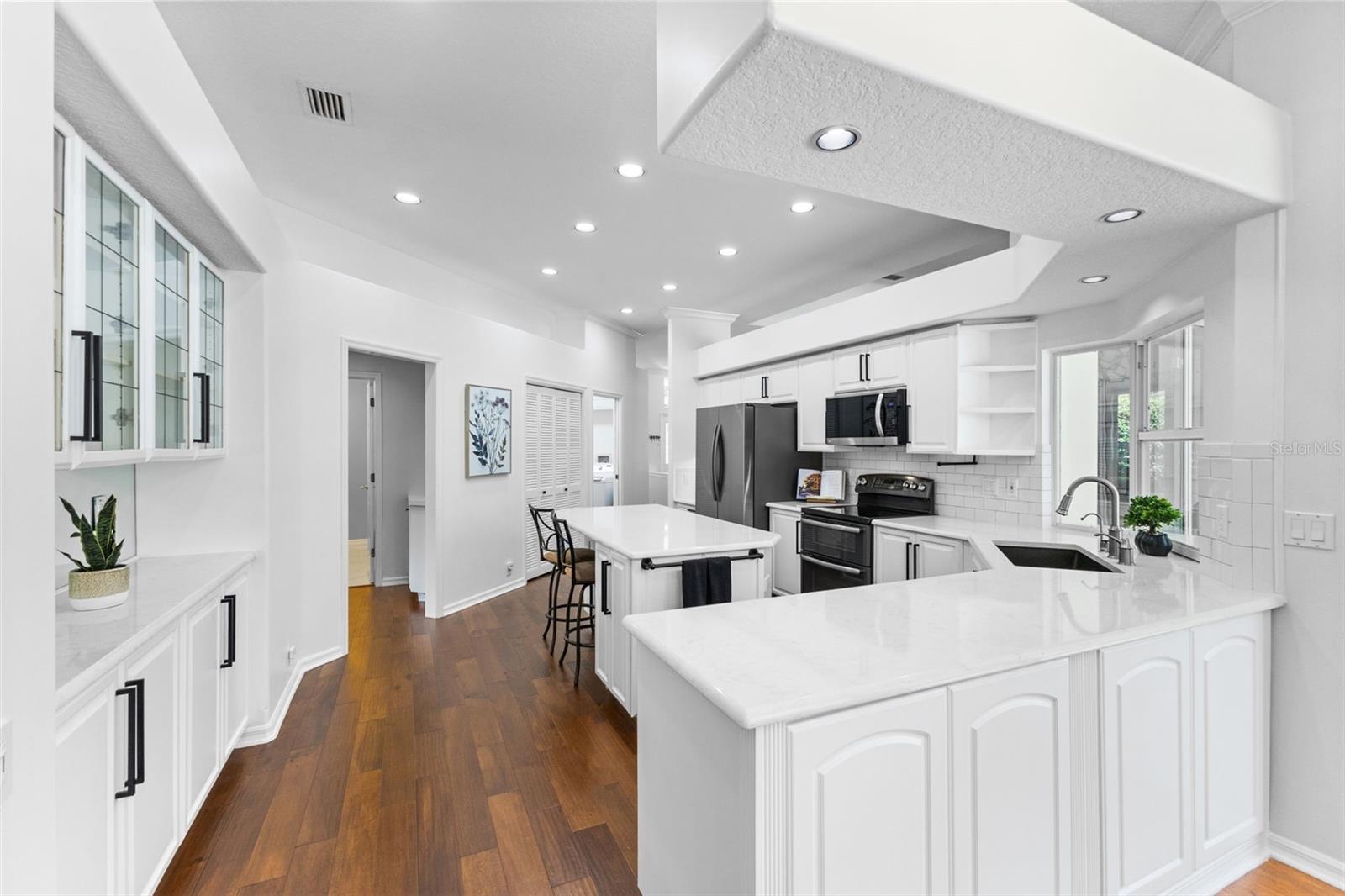 Large Kitchen and Family Room with Room for Counter Stools