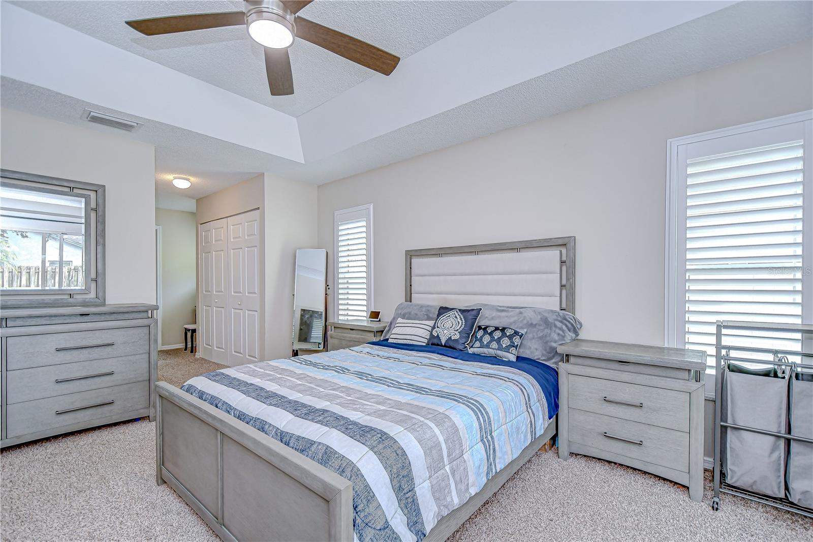 Tray ceilings and windows ad more natural light.