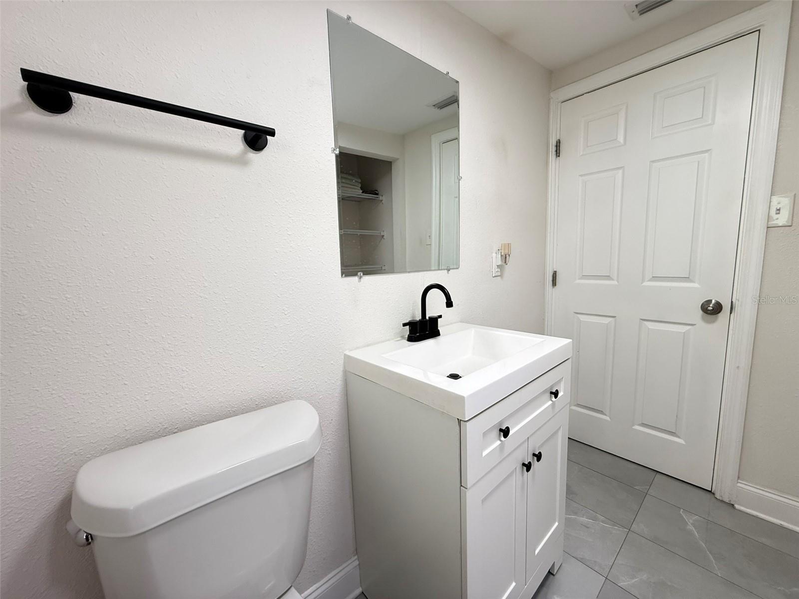 8027 N NEWPORT AVE, TAMPA, FL, 33604