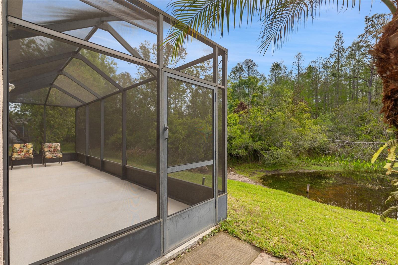 SCREENED PATIO ON CONSERVATION
