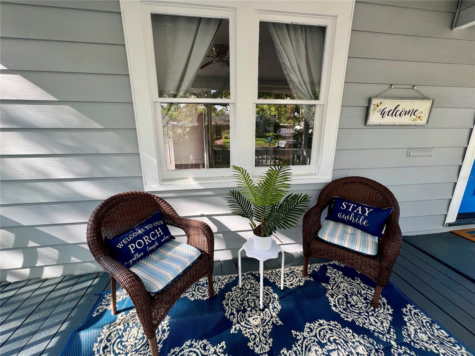 Take your first or last sip of the day on your ample and cozy covered front porch.