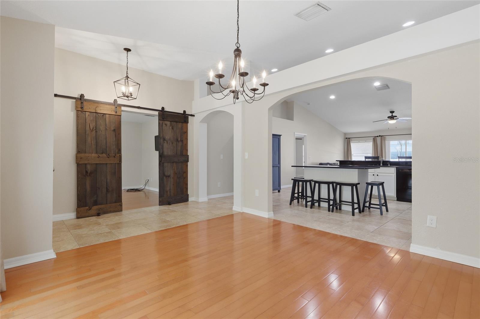 Dining room...view to kitchen and flex space/den