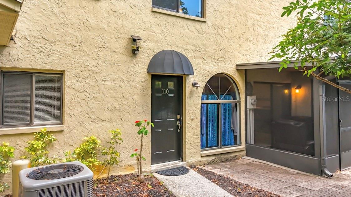 in front of a small wooded area (very quiet)