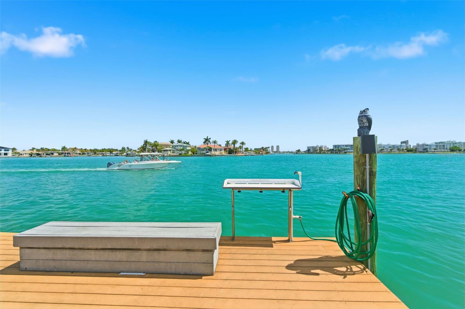 Cutting table at fishing dock with water
