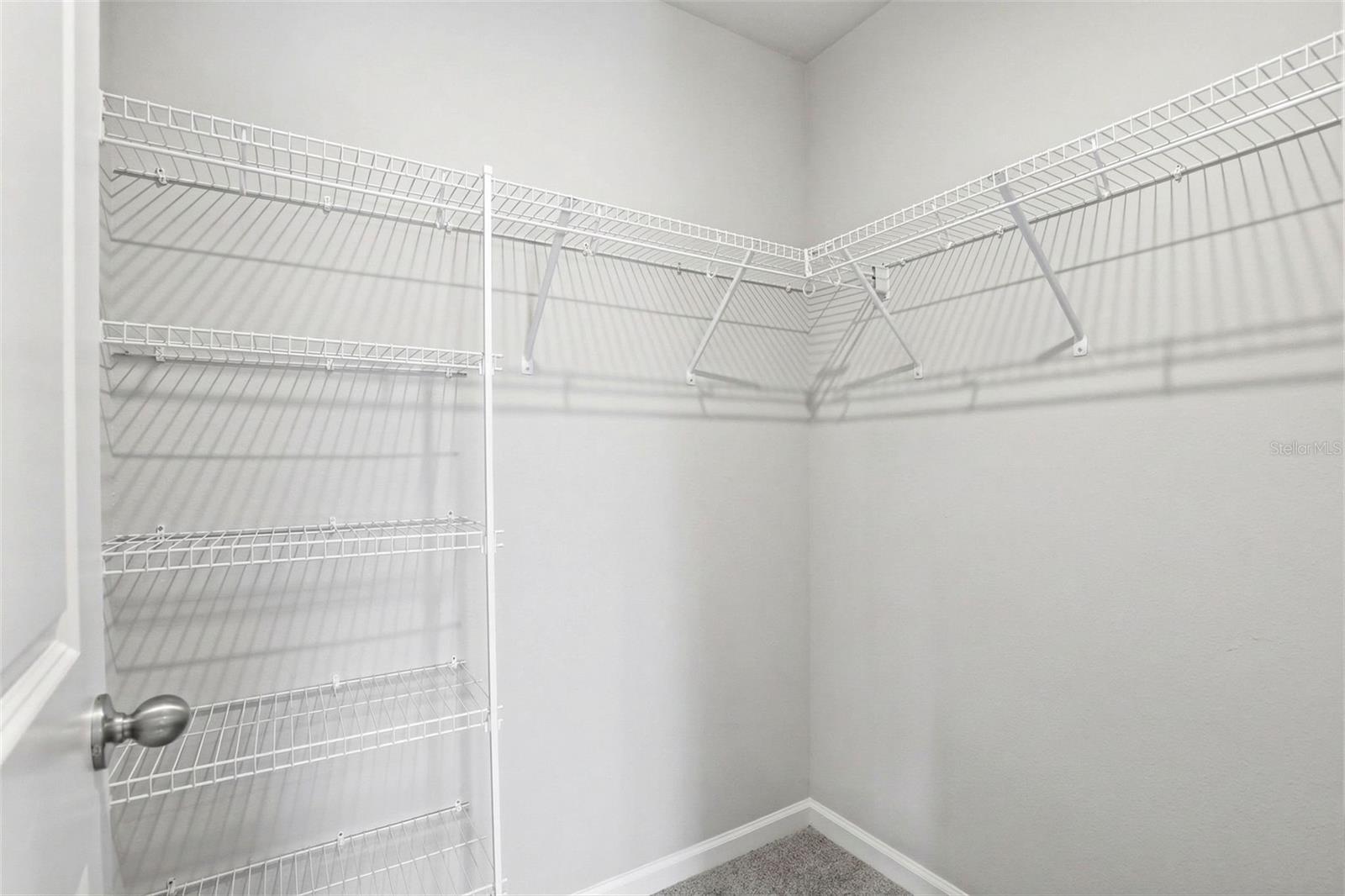 One Of Three Walk-in Closets