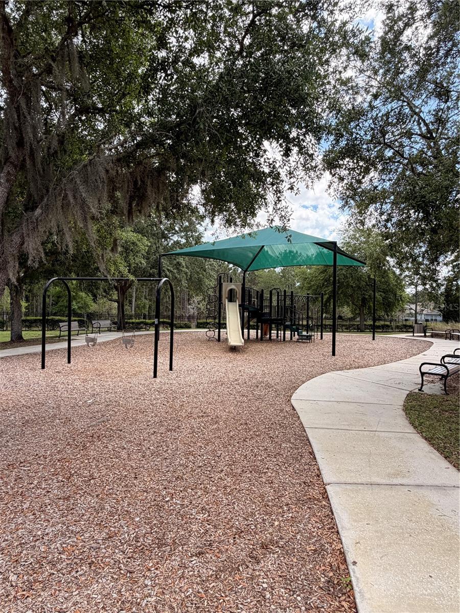 Imagine living in a community like this ??Shaded playground, walking paths, and a setting that feels quiet and welcoming.
