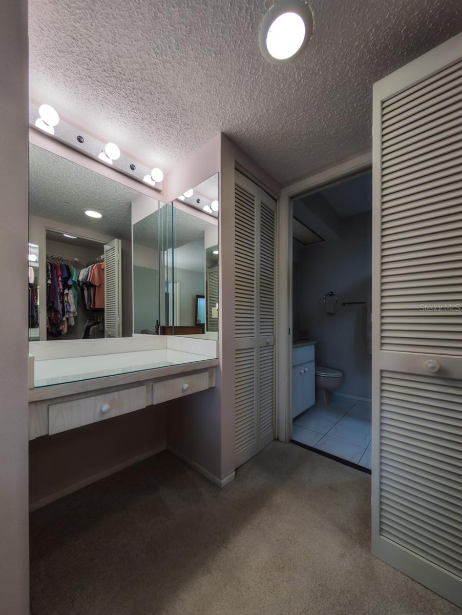 Primary bath has make up desk