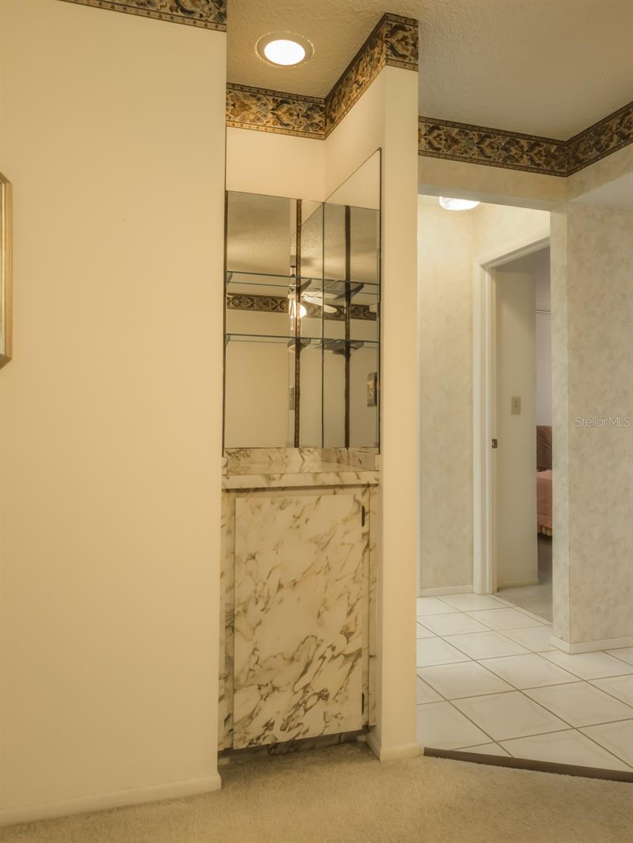 built in bar next to dining room