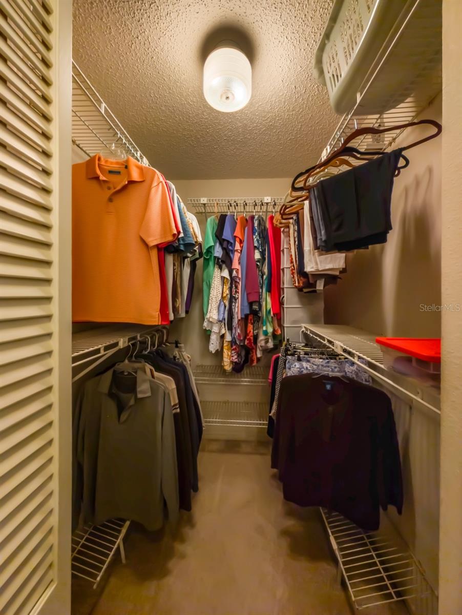 Walk in closet in masster bedroom