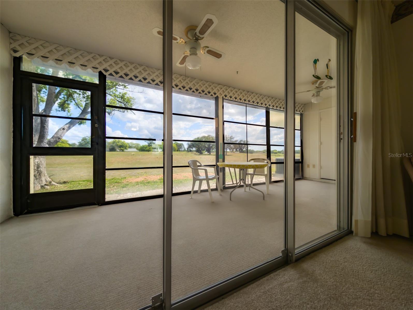 Tripple sliders to the screened porch