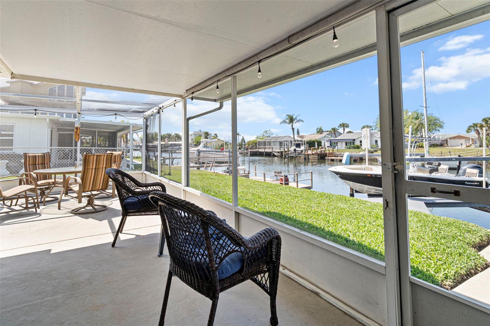 Covered Screened Lanai Overlooking Canal