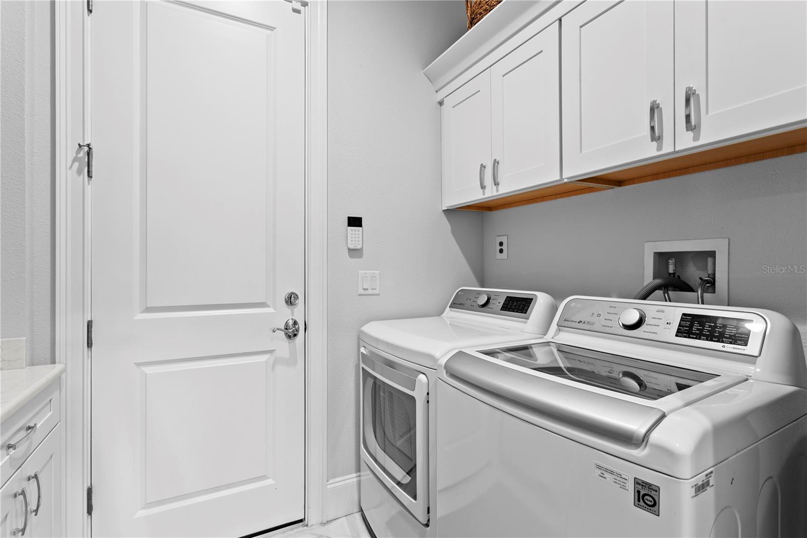 The laundry space is conveniently located to easy access