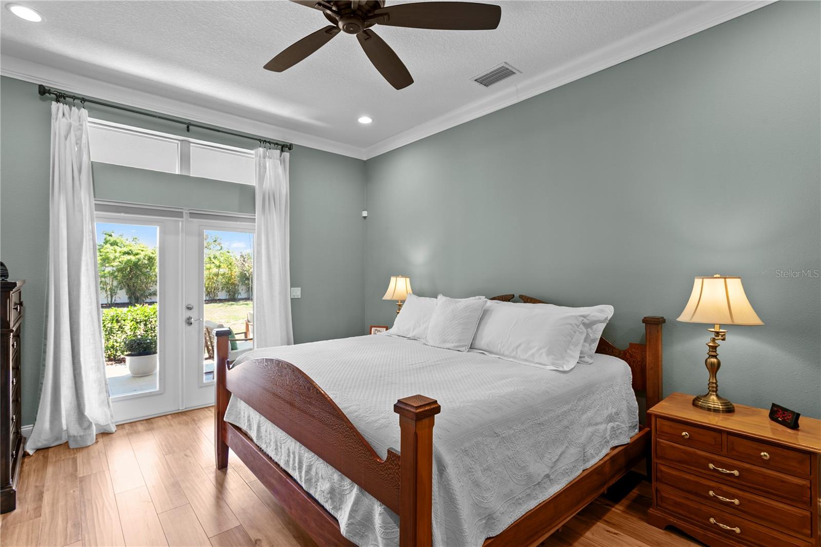 The 1st Floor Primary Bedroom enjoys access to the expanded lanai