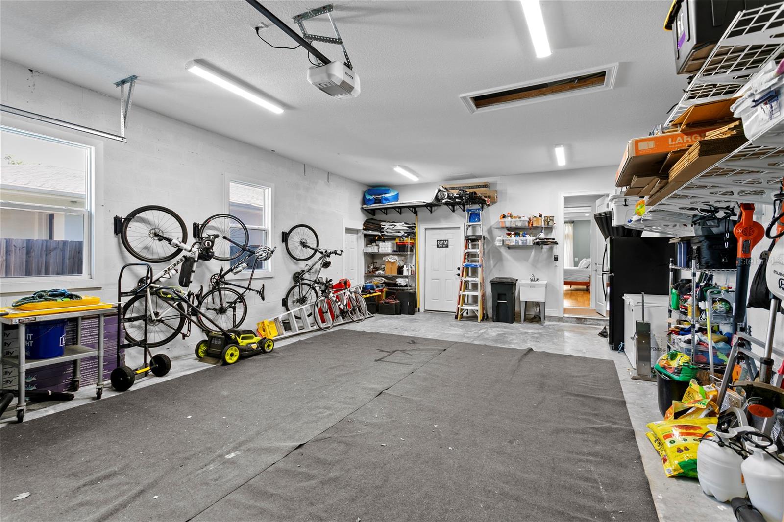The oversized and deep garage offers ample room for vehicles and storage