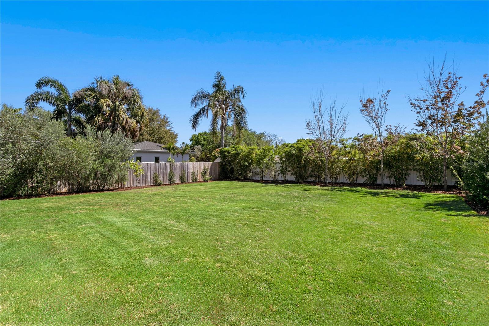 The oversized yard is roomy enough for pool PLUS other backyard accoutraments