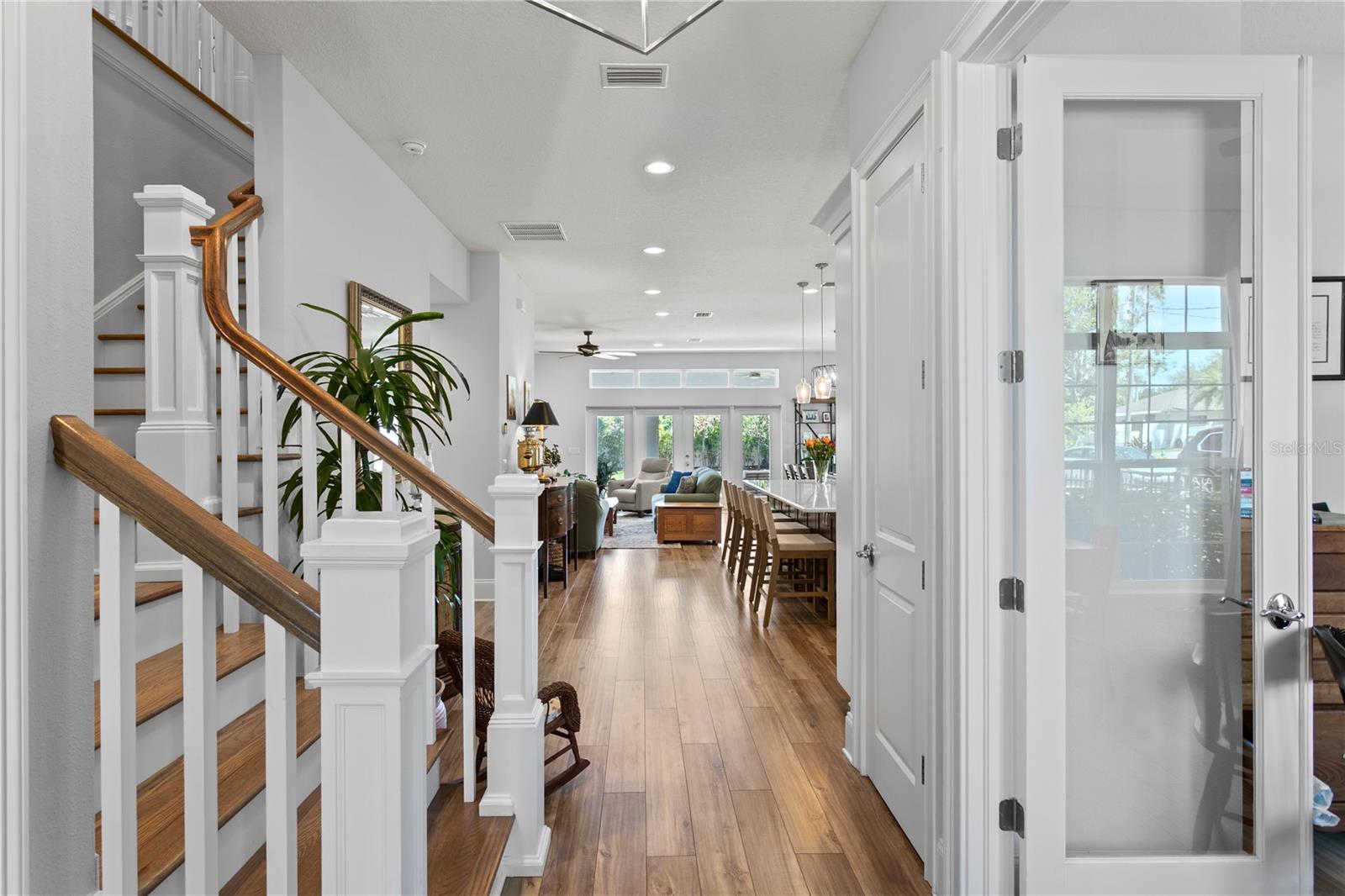 The center hall entry with substantial staircase sets the tone of the home