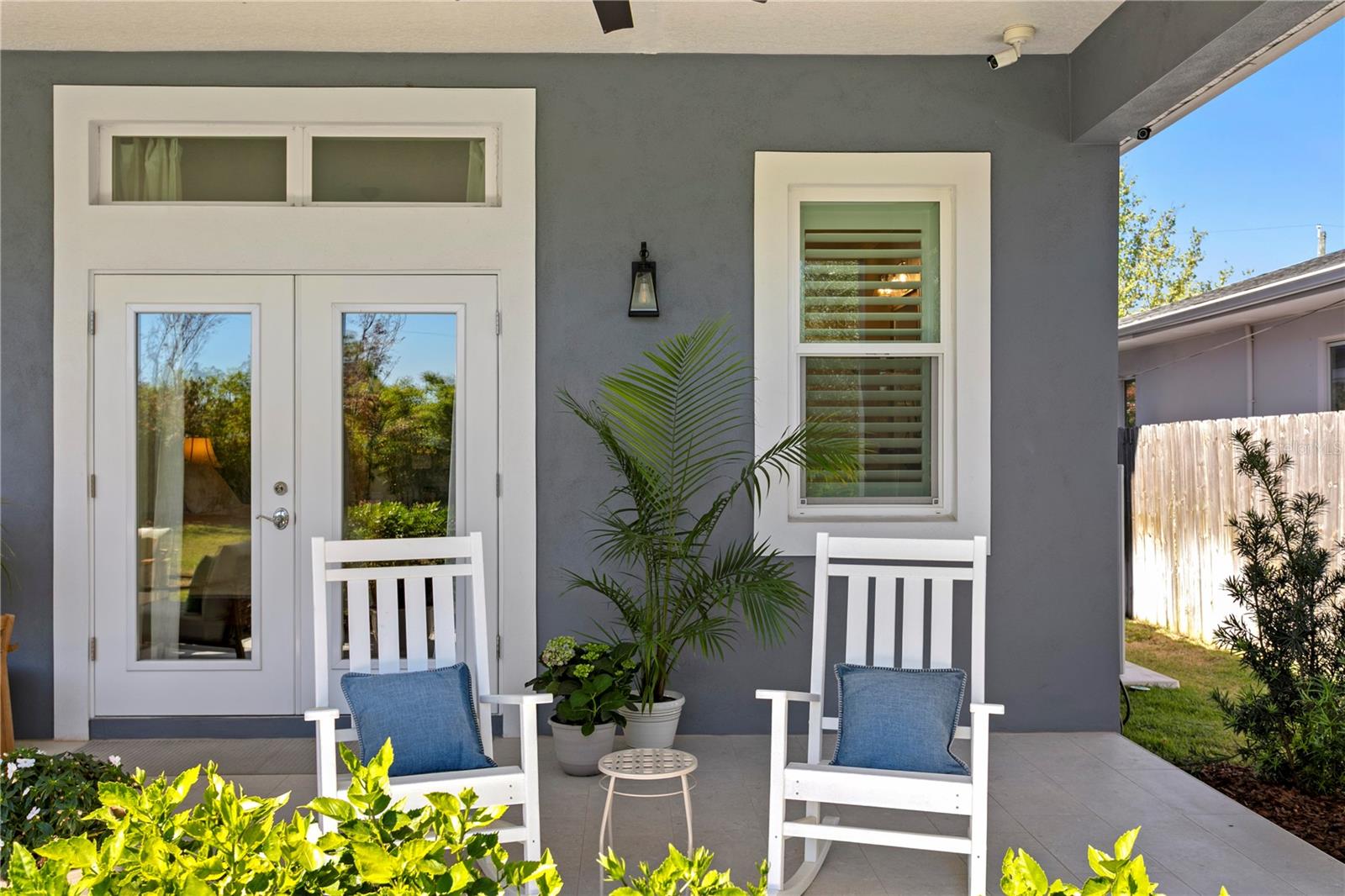 Rockers off of primary bedroom beckon you to come sit and relax