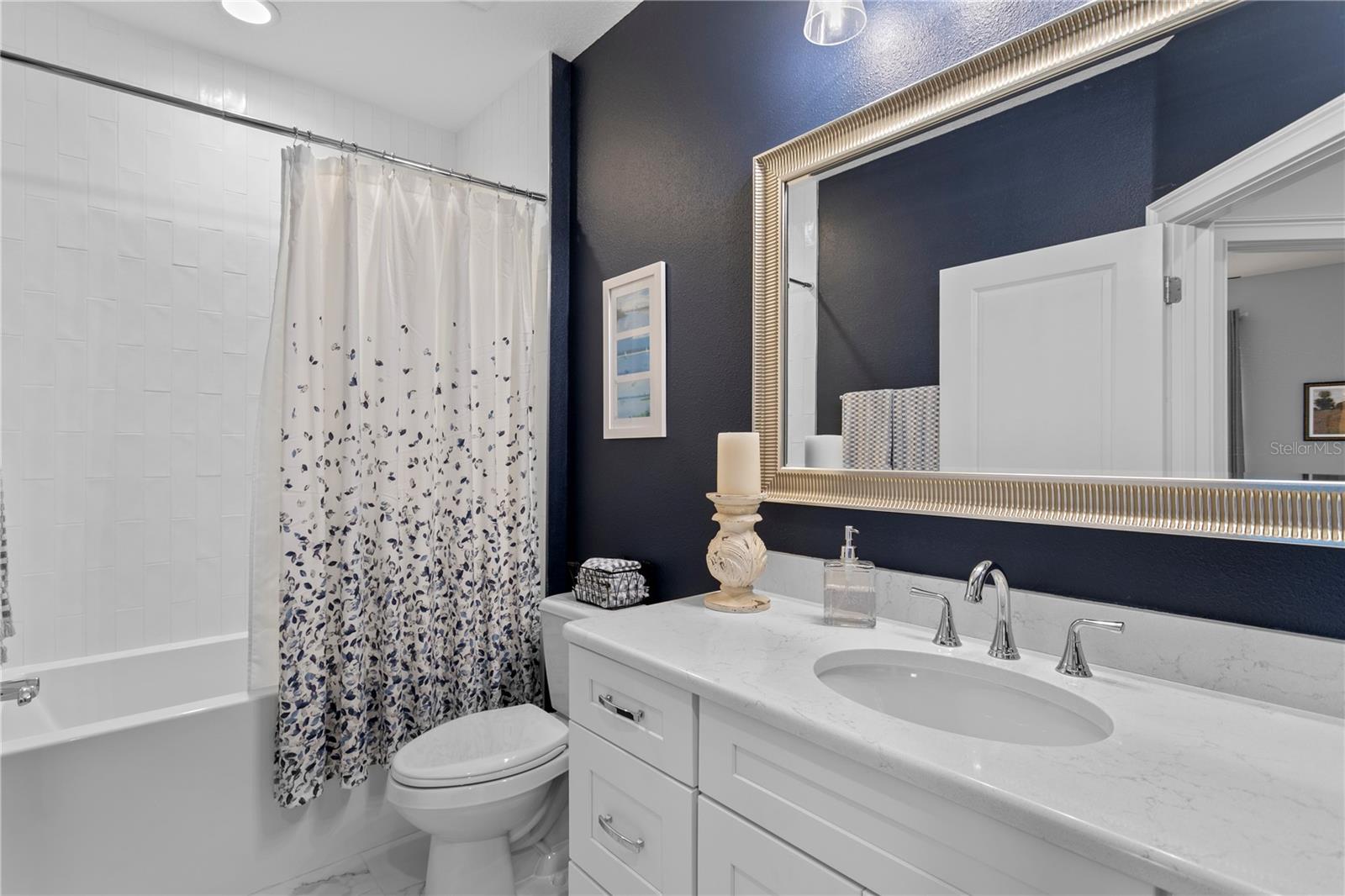 Hall bathroom serves the upstairs bedrooms