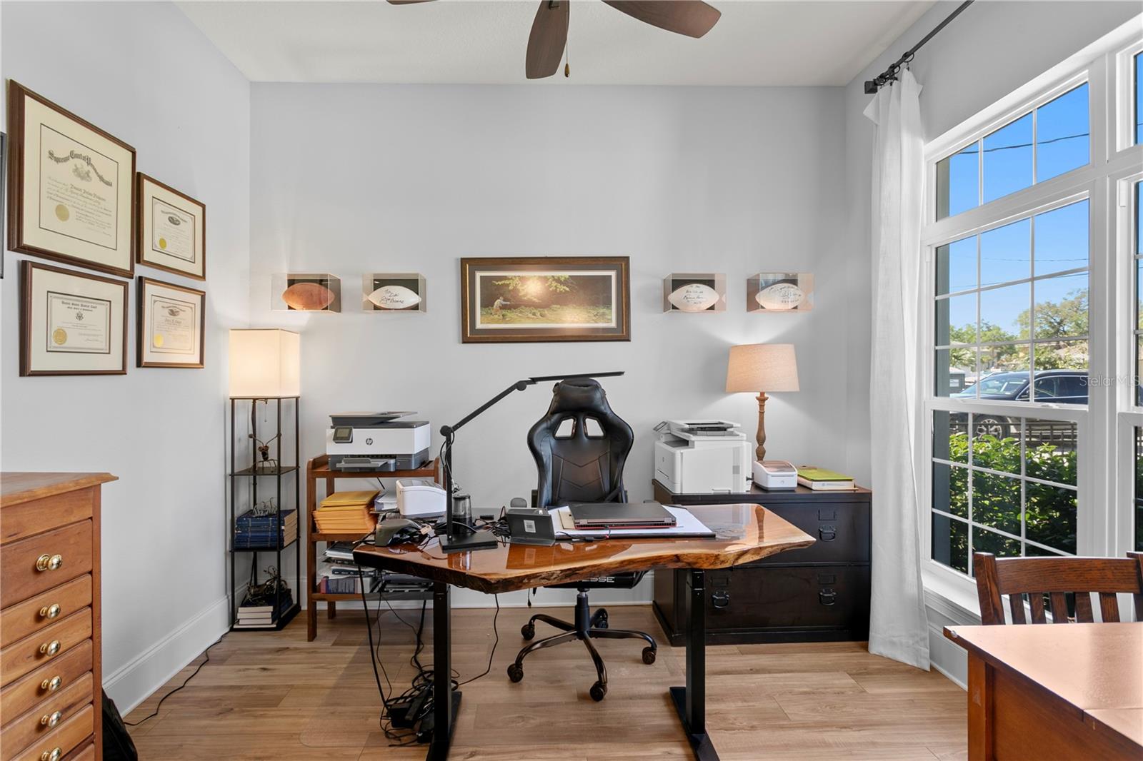 Notice the large window allowing natural light to fill the room