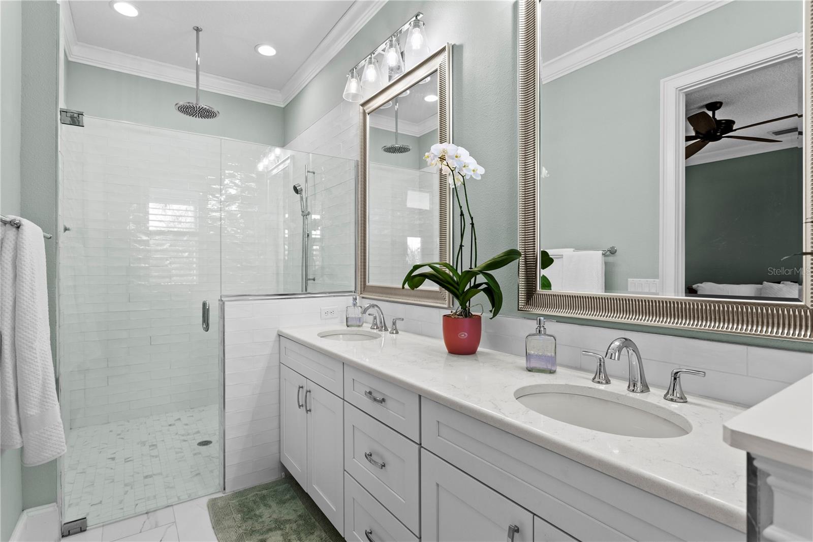 Primary Bedroom bath with dual sinks and oversized walk in shower