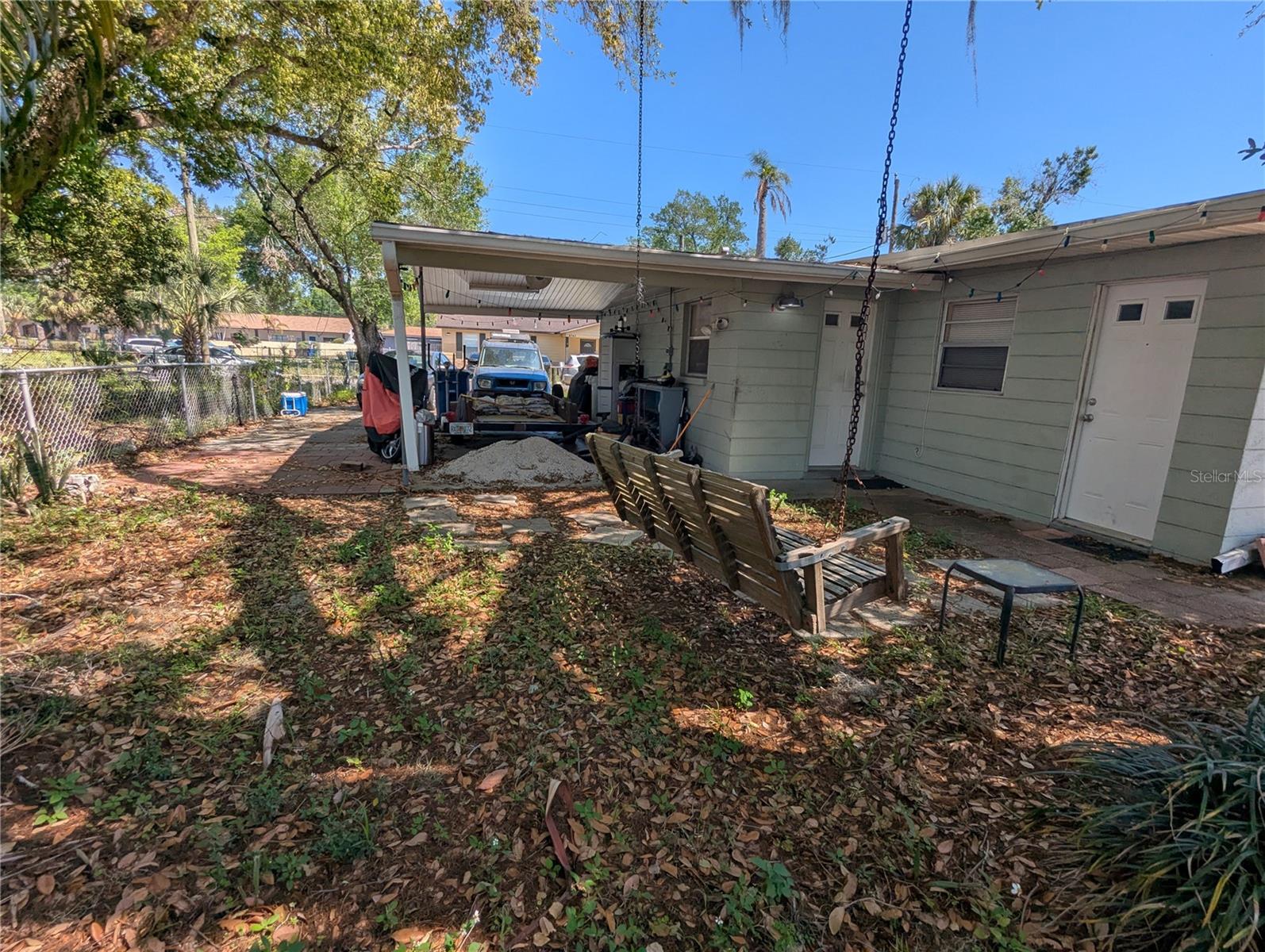 rear entry and large carport