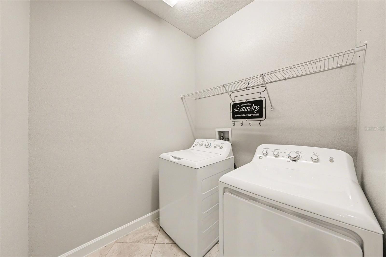 Indoor Laundry Room is perfectly located between the Primary Bath and the Kitchen.