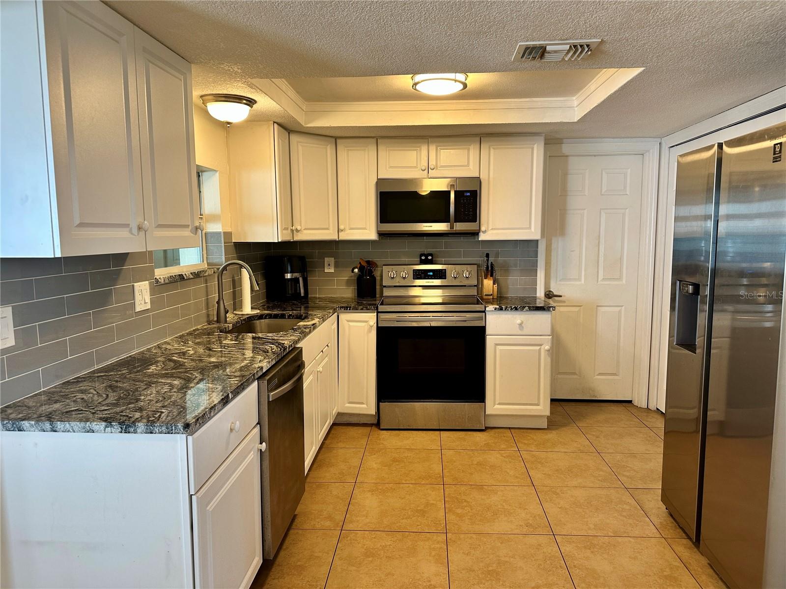 Upgraded Kitchen with granite
