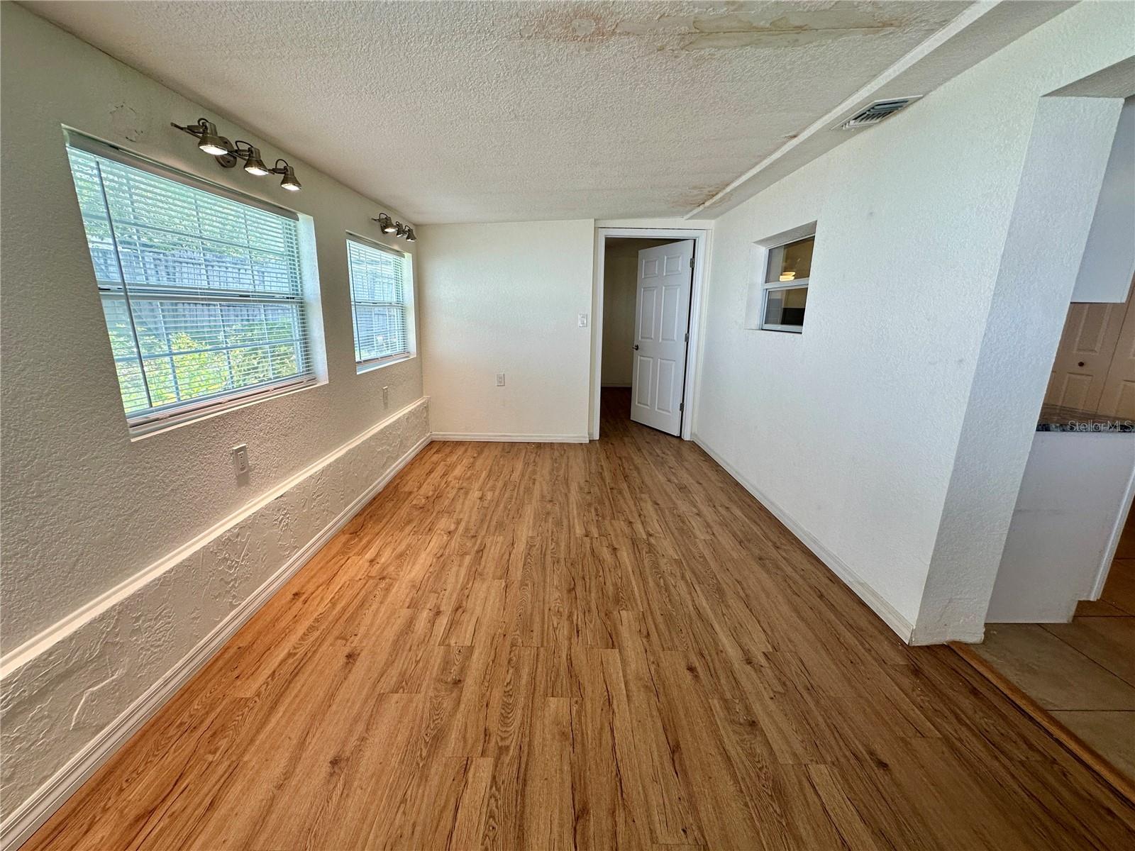 Family Room, door leading into Primary Bed/Bath