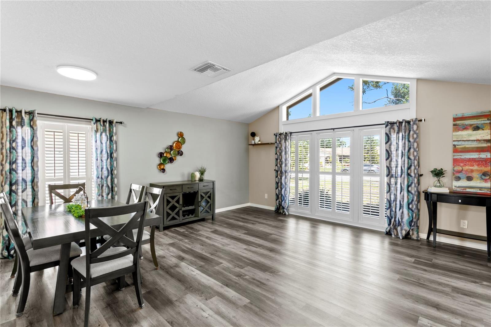 Enter home to large living room/dining room combo