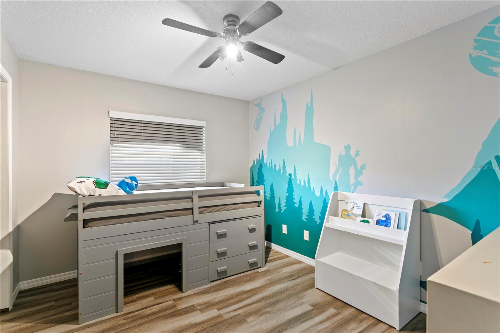 Bedroom #2 features a ceiling fan