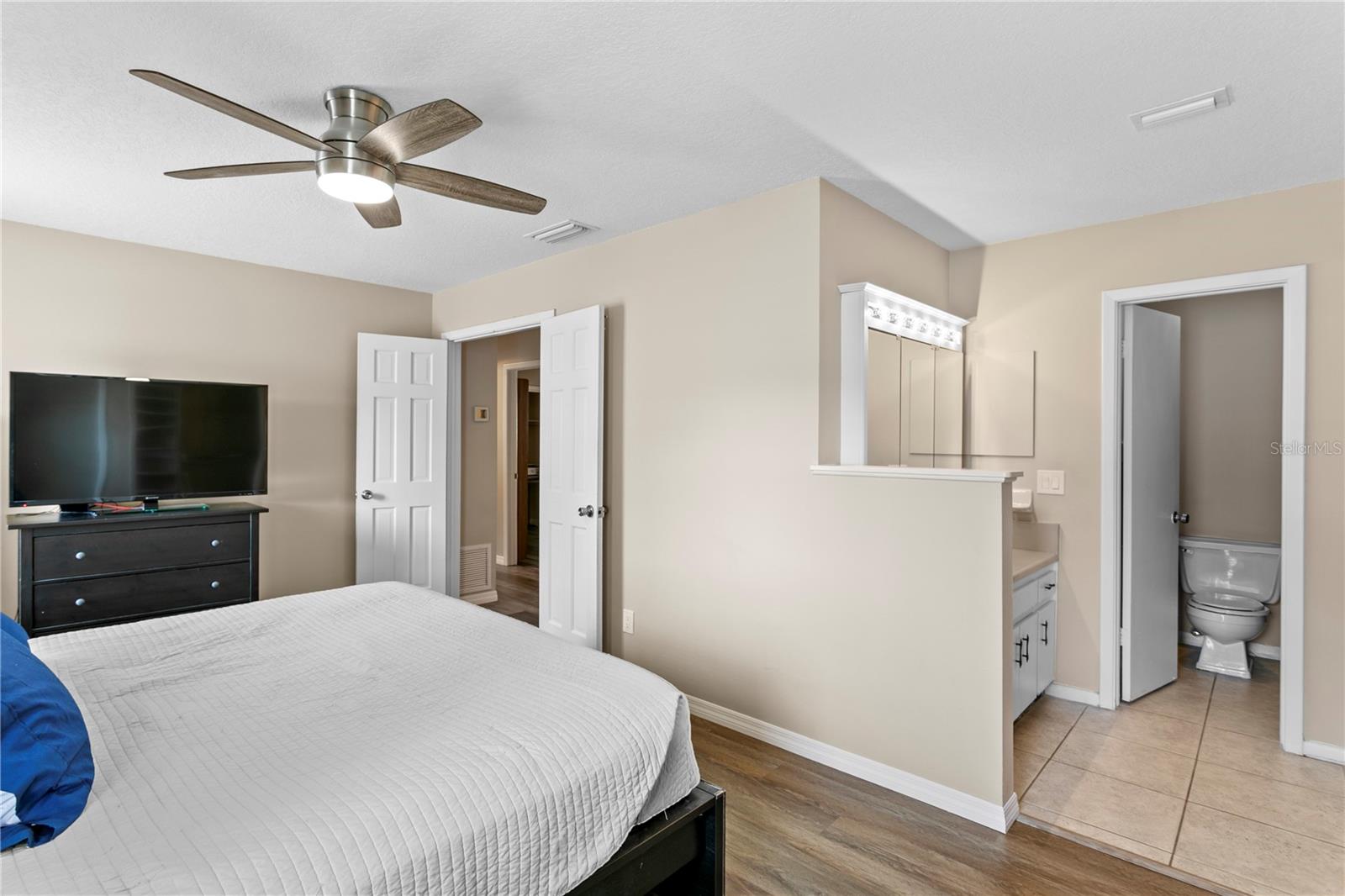 View from primary bedroom to ensuite bath