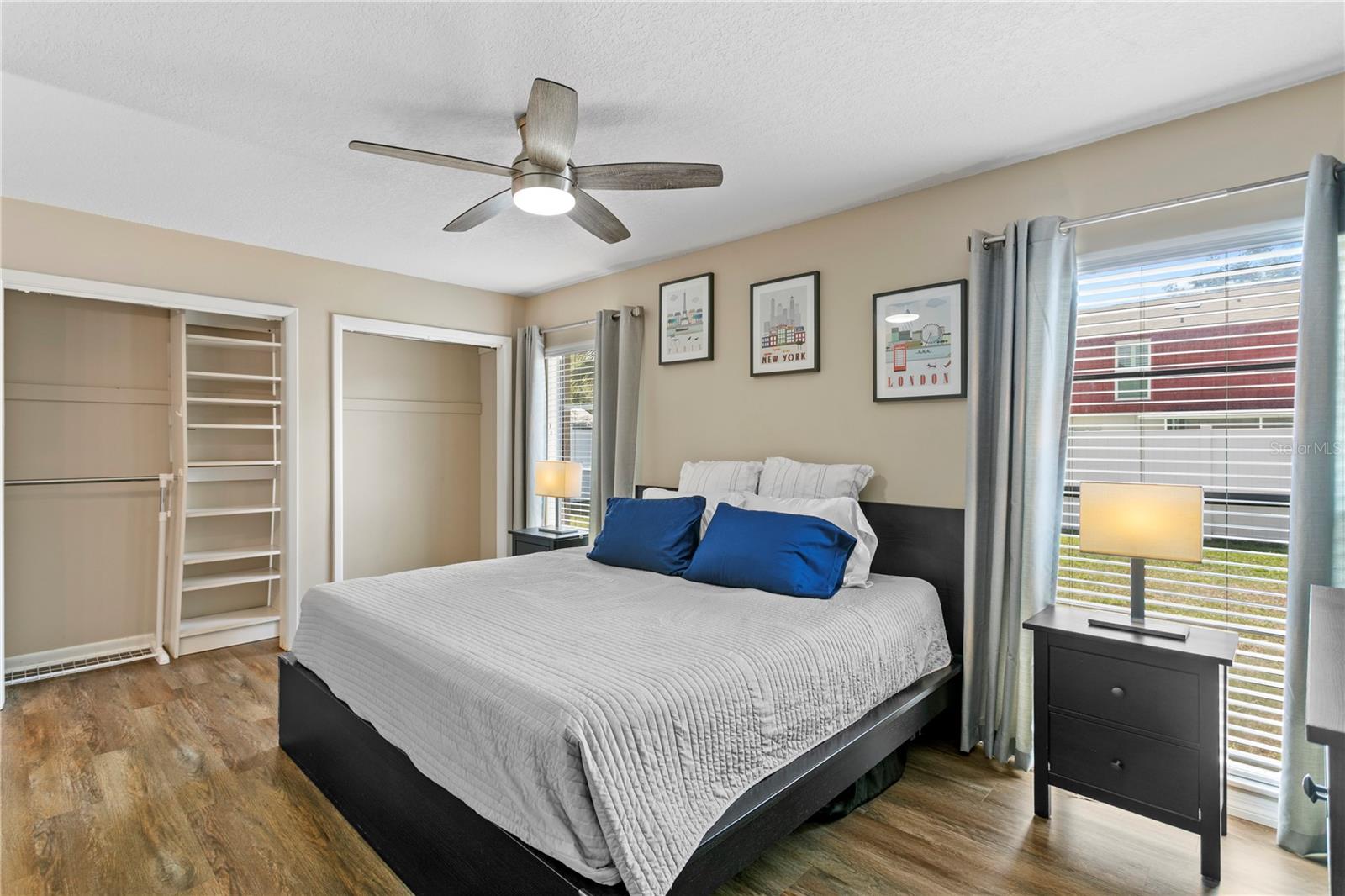 Primary bedroom with luxury vinyl flooring