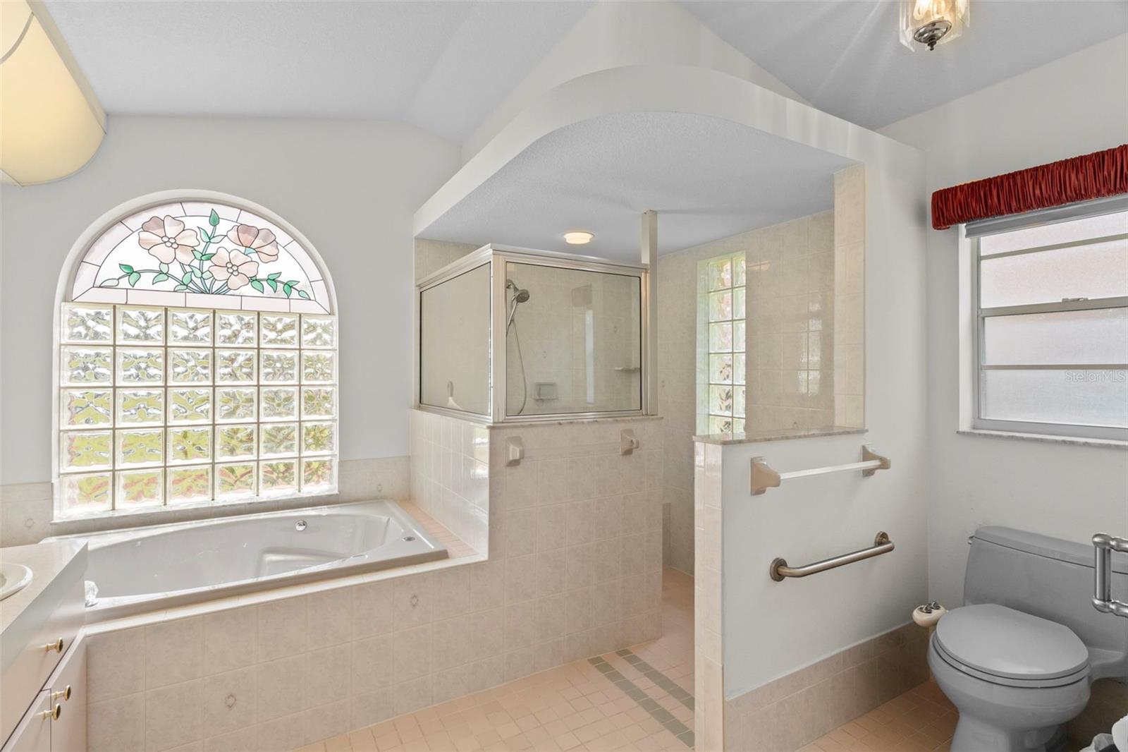 Primary Bathroom - Tub - Walk-in Shower - Toilet Area