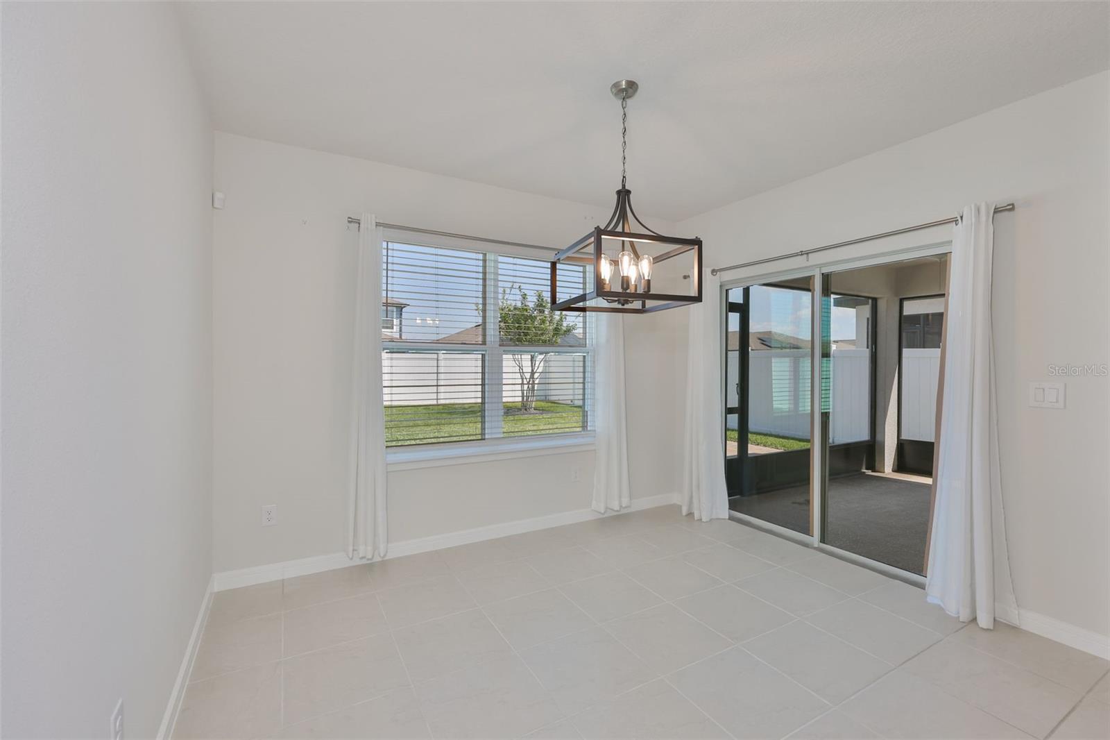 Dining Room Looking into the Screened in Lanai