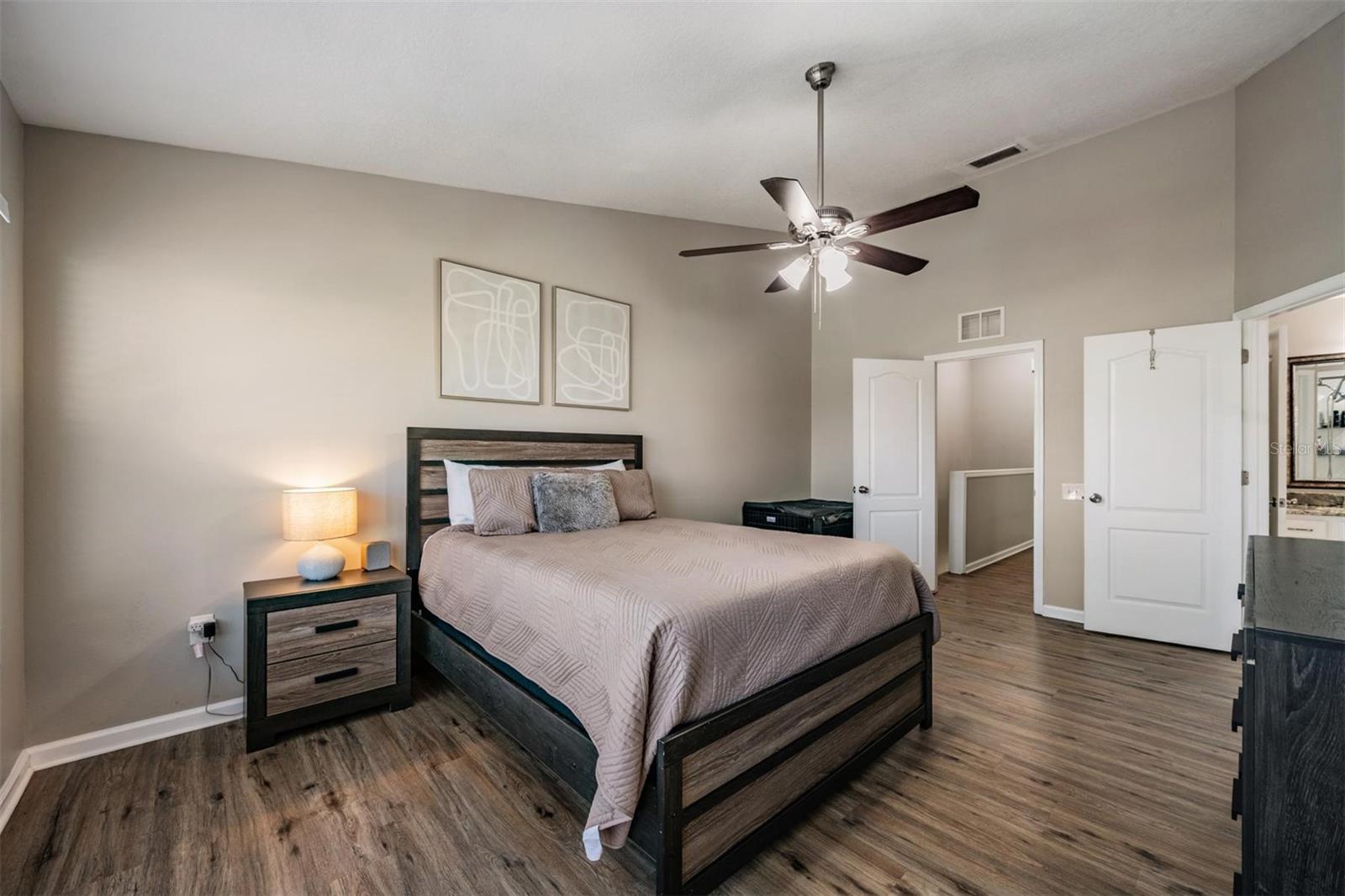 Large primary with vaulted ceiling.