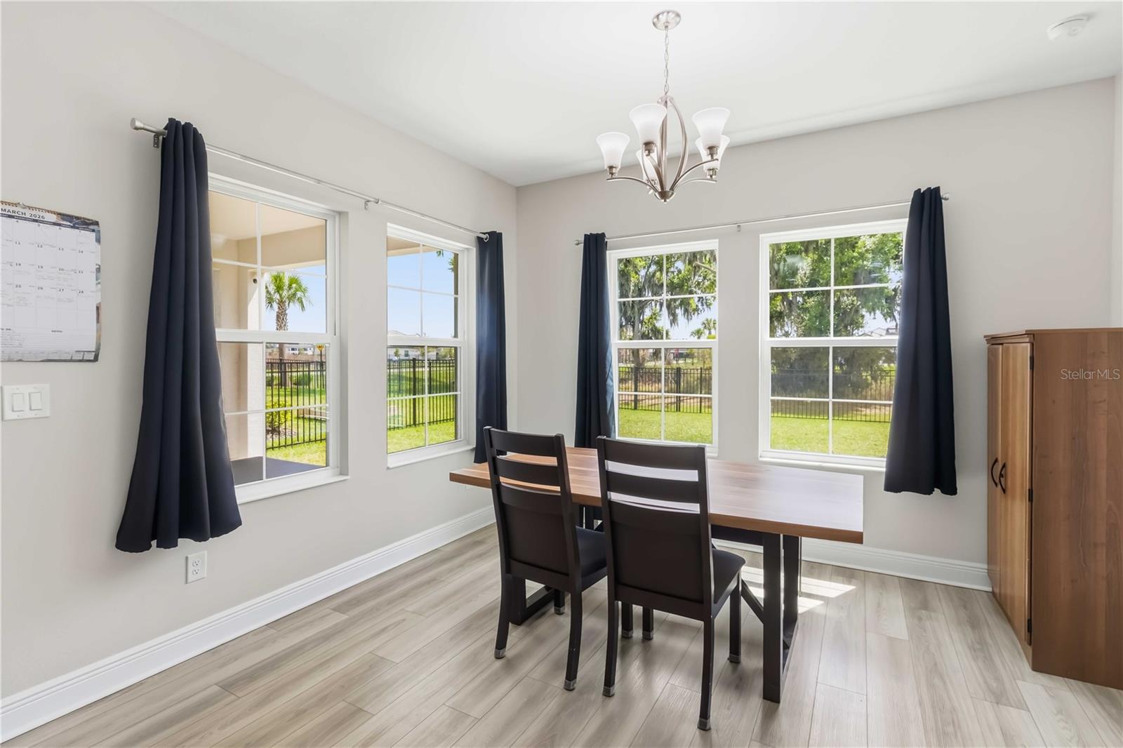 Large Dining Space Overlooking Backyard