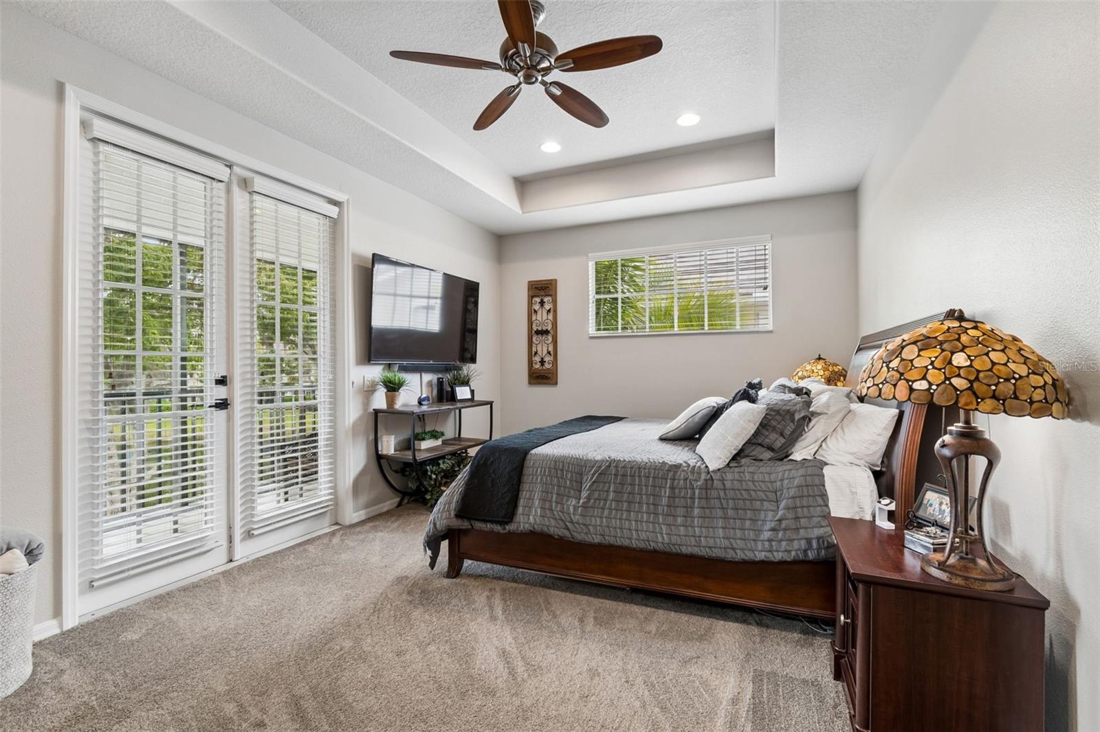 Primary Bedroom with French Doors to private balcony